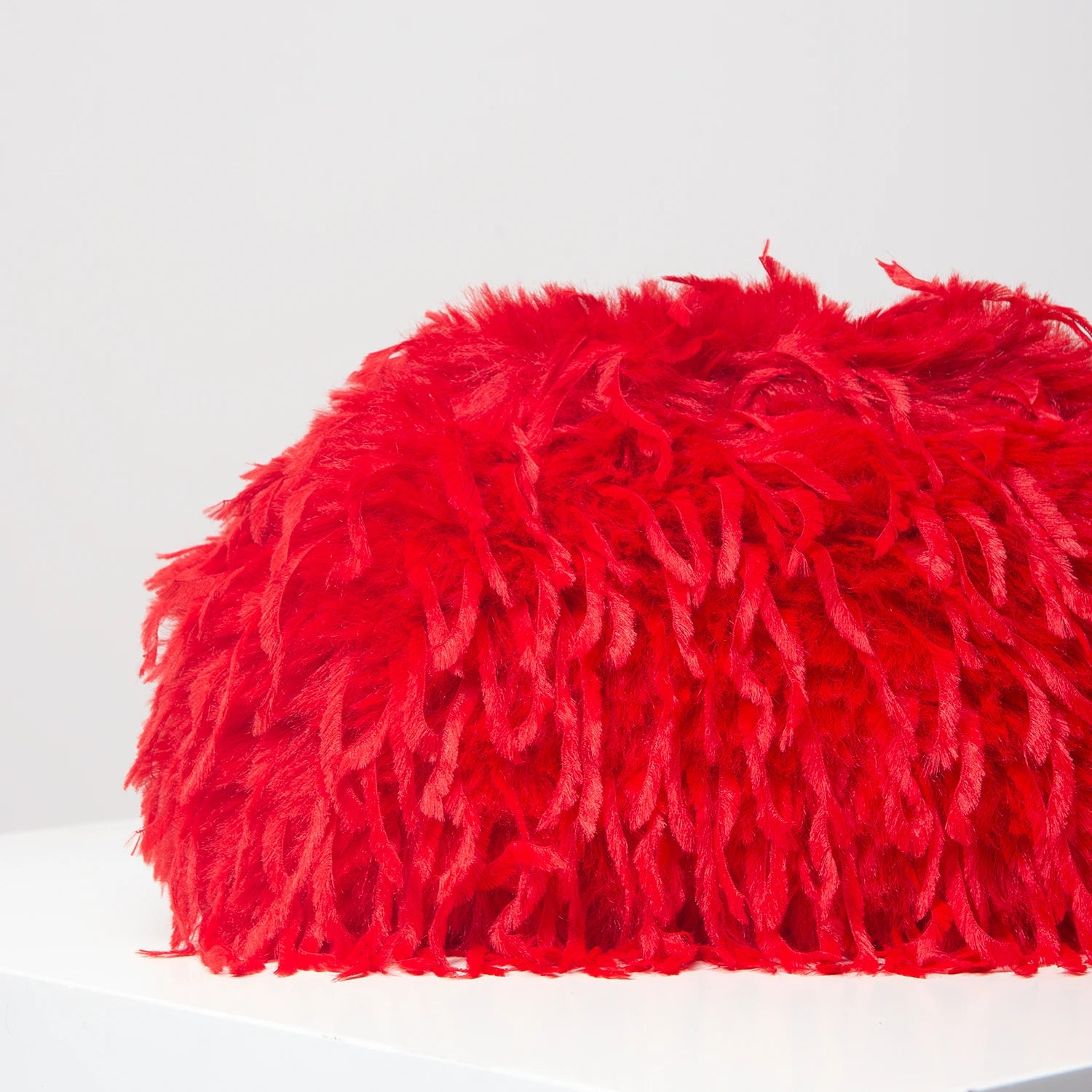 Pochette kiss lock à plumes