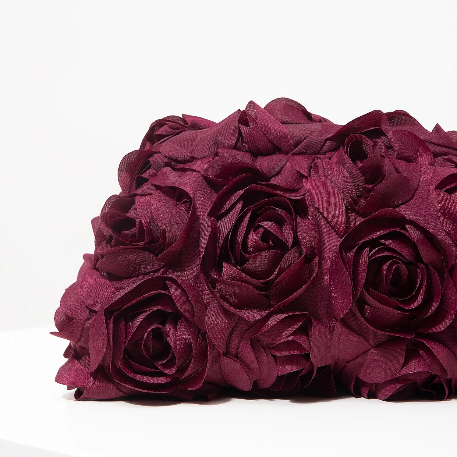 Pochette clutch a motif fleuries roses