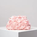Pochette clutch a motif fleuries roses