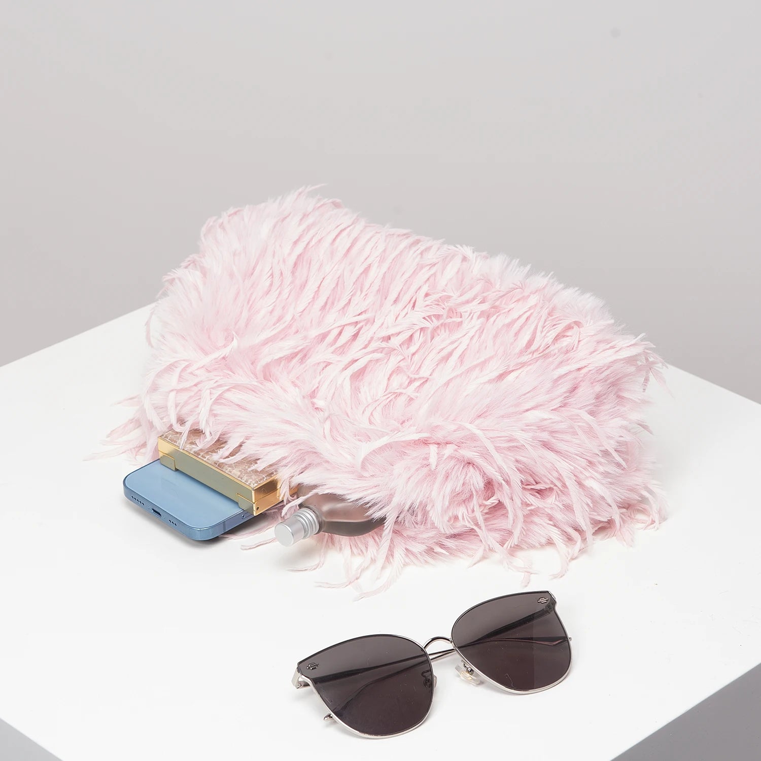 Pochette kiss lock à plumes