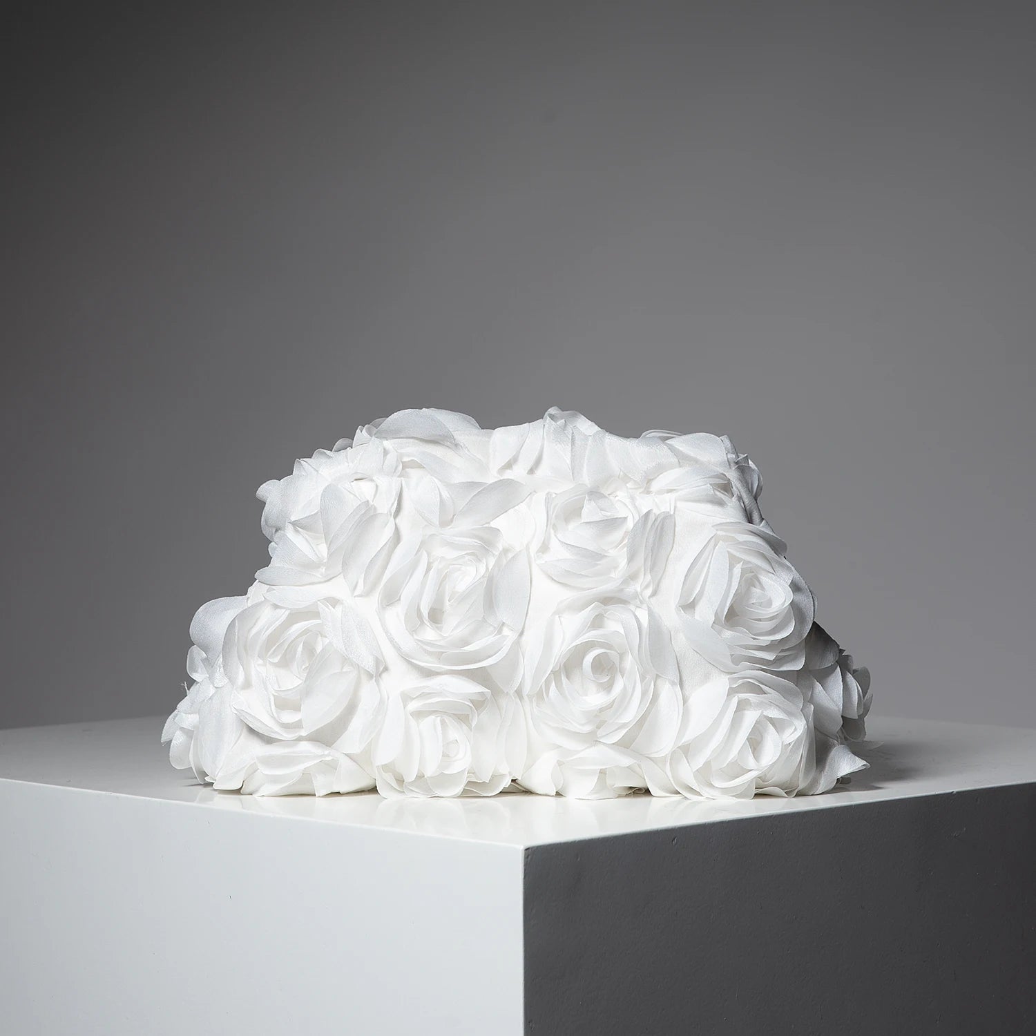 Pochette clutch a motif fleuries roses