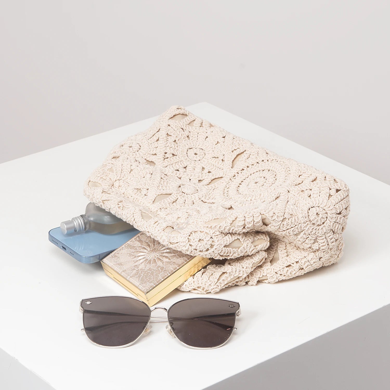 Pochette clutch en tissus à motif